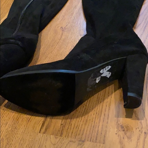 Over the knee heeled booties